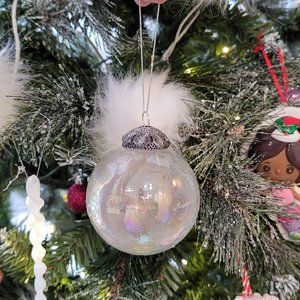 Large heavy glass irridescent white Christmas ornament very pretty and one of a